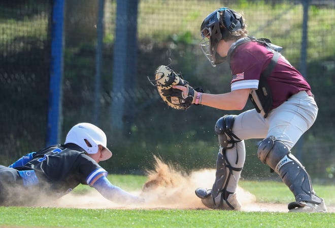 Brandywine's Ryan DePasquale gets back to the bag as Concord catcher Adam Ferguson takes a throw behind him after a single in the third inning of Concord's 3-1 win at Brandywine High School, Tuesday, April 23, 2024.