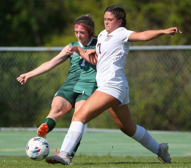 Saint Mark's Brynn Casapulla (left) and Caravel's Reese Mushinski vie for the ball in first half of the Bucs' 1-0 overtime win at Saint Mark's High School, Wednesday, April 24, 2024.