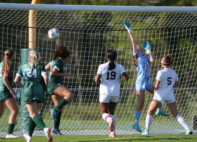 Saint Mark's Marissa Cirillo can't stop a corner kick off the foot of Caravel's Grace Slapcinsky from hitting the back of the net late in the first overtime of the Bucs' 1-0 win at Saint Mark's High School, Wednesday, April 24, 2024.