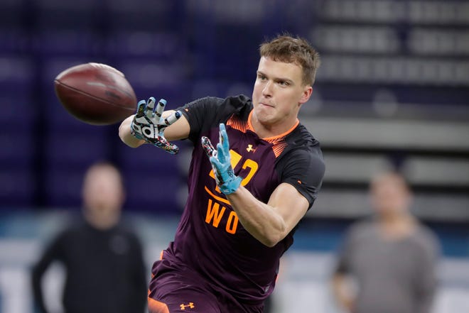 West Virginia wide receiver David Sills V runs a drill at the NFL football scouting combine in Indianapolis, Saturday, March 2, 2019. (AP Photo/Michael Conroy)