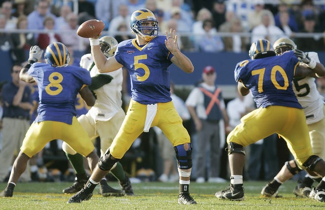 Delaware quarterback Joe Flacco throws behind the protection of tight end Ben Patrick (8) and lineman Kheon Hendricks in the second half of the Blue Hens' win over William and Mary, 28-14, at Delaware Stadium, Saturday , Nov. 11, 2006 in Newark, Del.