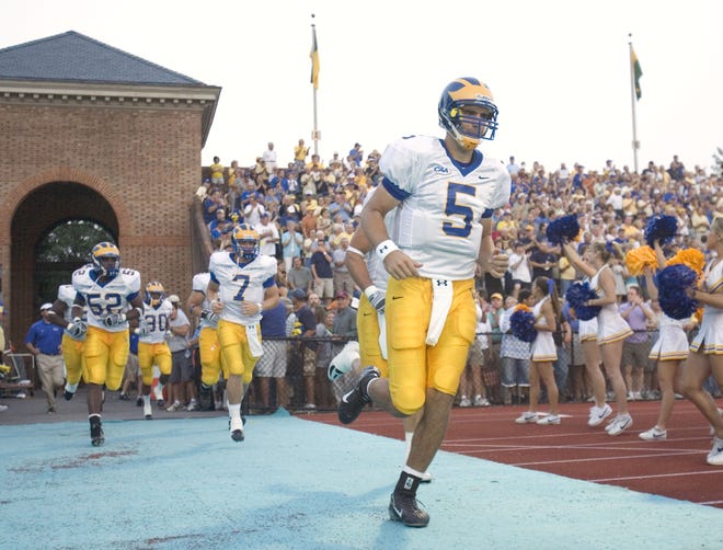 University of Delaware quarerback Joe Flacco heads onto the field with his teammates before playing William and Mary in Wiliamsburg, Va. on Aug. 31, 2007.