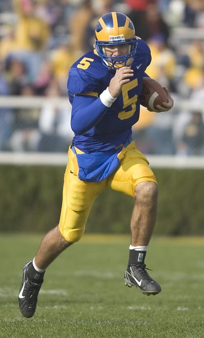 Delaware quarterback Joe Flacco keeps the ball and picks up 25 yards on a third quarter scoring drive in the Blue Hens' 37-34 win against James Madison at Delaware Stadium in Newark, Del., Saturday, Nov. 3, 2007.