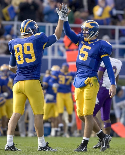 Delaware tight end Robbie Agnone (left) and quarterback Joe Flacco celebrate after the final snap as the Blue Hens win, 37-34 against James Madison at Delaware Stadium in Newark, Del., Saturday, Nov. 3, 2007.
