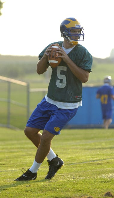 Joe Flacco (No. 5) on the UD practice field for the first practice of the summer Aug. 3, 2007.