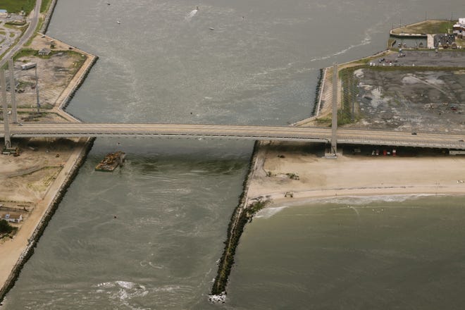 This 2013 image shows demolition work to remove the bridge previous to today's cable-stayed bridge over the Indian River Inlet.