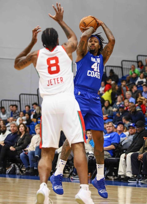 Delaware Bluecoats Forward ISAIAH MILES (41) attempts a jump shot as Maine Red Claws Forward SHELDON JETER (8) defends in the first half of a NBA G-League regular season basketball game between the Bluecoats and the Maine Red Claws (Boston Celtics) Saturday, Nov. 09, 2019, at the 76ers Fieldhouse in Wilmington, DE