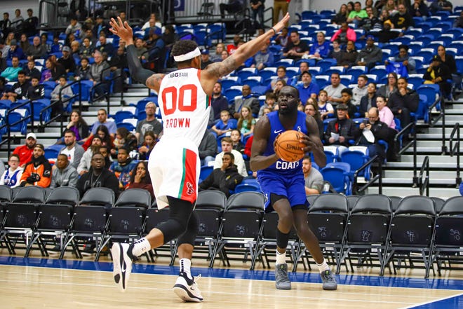 Delaware Bluecoats Guard MARIAL SHAYOK (35) attempts a shot as Maine Red Claws Guard BRYCE BROWN (00) defends in the first half of a NBA G-League regular season basketball game between the Bluecoats and the Maine Red Claws (Boston Celtics) Saturday, Nov. 09, 2019, at the 76ers Fieldhouse in Wilmington, DE