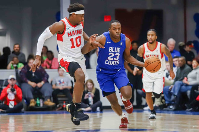 Delaware Bluecoats Guard JARED BROWNRIDGE (23) drives to the lane as Maine Red Claws Guard JUSTIN BIBBS (10) defends in the first half of a NBA G-League regular season basketball game between the Bluecoats and the Maine Red Claws (Boston Celtics) Saturday, Nov. 09, 2019, at the 76ers Fieldhouse in Wilmington, DE