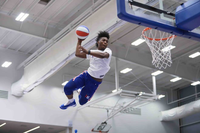 Philadelphia 76ers dunk squad member performs during a halftime show during a NBA G-League regular season basketball game between the Bluecoats and the Maine Red Claws (Boston Celtics) Saturday, Nov. 09, 2019, at the 76ers Fieldhouse in Wilmington, DE