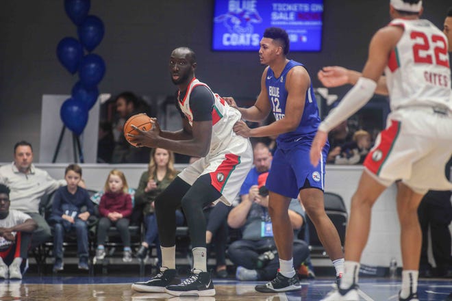 Maine Red Claws Center TACKO FALL (99) backs down Delaware Bluecoats Center DORAL MOORE (12) in the first half of a NBA G-League regular season basketball game between the Bluecoats and the Maine Red Claws (Boston Celtics) Saturday, Nov. 09, 2019, at the 76ers Fieldhouse in Wilmington, DE