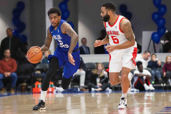 Delaware Bluecoats guard Xavier Munford is defended by Maine Red Claws guard Jaysean Paige in a G League game Nov. 9, 2019, at the 76ers Fieldhouse in Wilmington, Delaware.