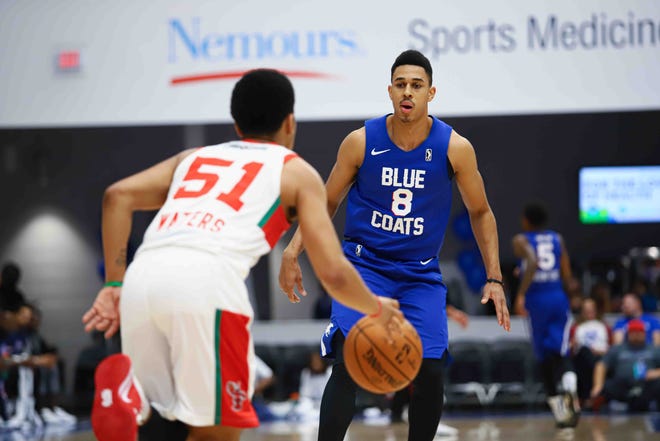 Delaware Bluecoats Guard ZHAIRE SMITH (8) "on NBA Assignment from 76ers" plays defense in the first half of a NBA G-League regular season basketball game between the Bluecoats and the Maine Red Claws (Boston Celtics) Saturday, Nov. 09, 2019, at the 76ers Fieldhouse in Wilmington, DE