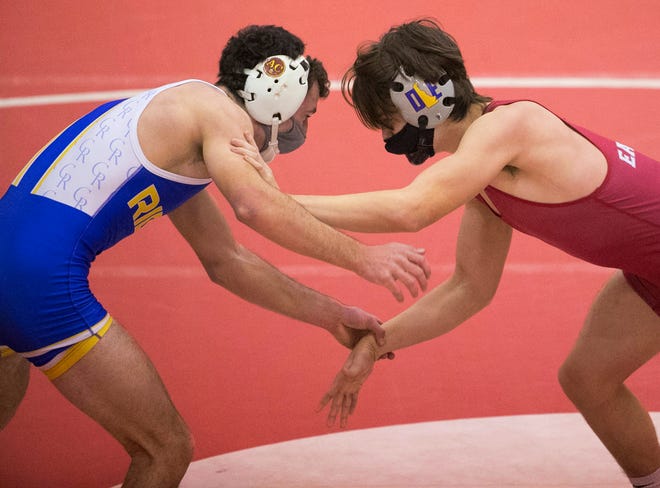 Caesar Rodney's Joshua Harvey (left) works toward a win  by 13-12 decision against Brandon West at 152 pounds in Smyrna's 46-32 win Wednesday, Jan. 27, 2021.