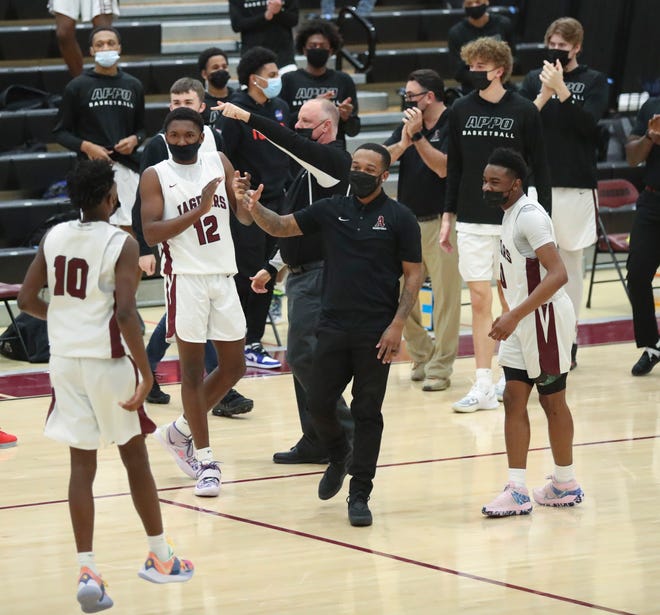 Appoquinimink celebrate their win after the Jaguars' 50-46 win against Middletown at home Thursday, Jan. 28, 2021.