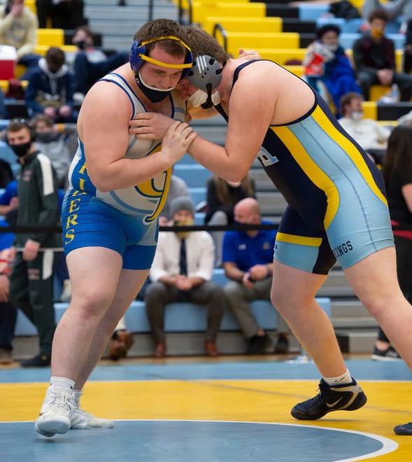 Caesar Rodney's Kevin Hudson (left) and Cape Henlopen's Lucas Ruppert wrestle in the 285 pound championship match at the DIAA State Individual Wrestling Championship at Cape Henlopen High School Wednesday, March 3, 2021.