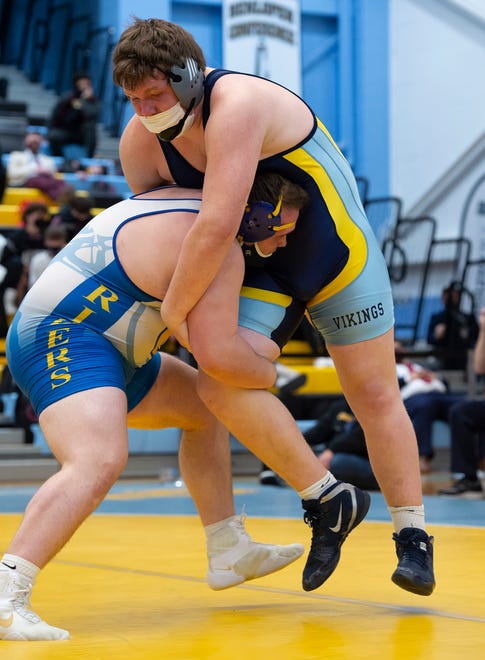 Caesar RodneyÕs Kevin Hudson (left) and Cape HenlopenÕs Lucas Ruppert wrestle in the 285 pound championship match at the DIAA State Individual Wrestling Championship at Cape Henlopen High School Wednesday, March 3, 2021.
