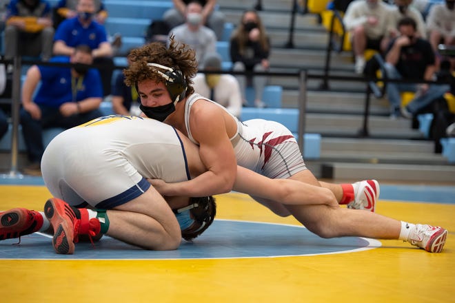 Sanford's Justin Griffith and Caravel's Matthew Duarte wrestle in the 170 pound championship match at the DIAA State Individual Wrestling Championship at Cape Henlopen High School Wednesday, March 3, 2021.
