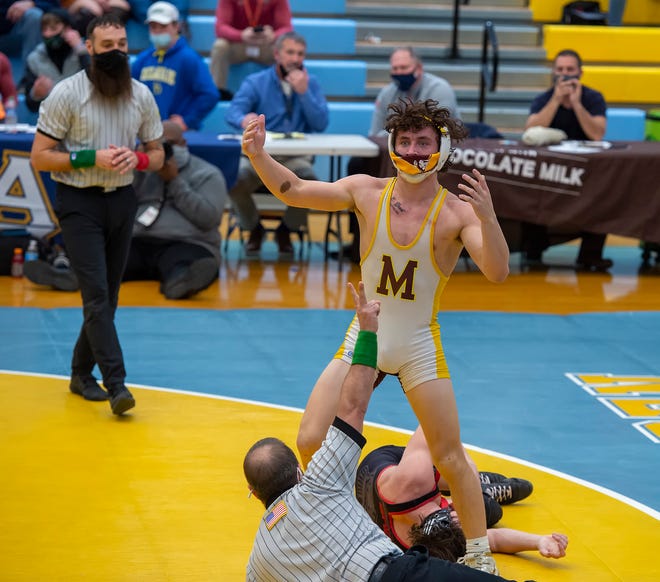 William Penn's Danny Sinclair is defeated by Milford's Trent Grant in the 132 pound championship match at the DIAA State Individual Wrestling Championship at Cape Henlopen High School Wednesday, March 3, 2021.