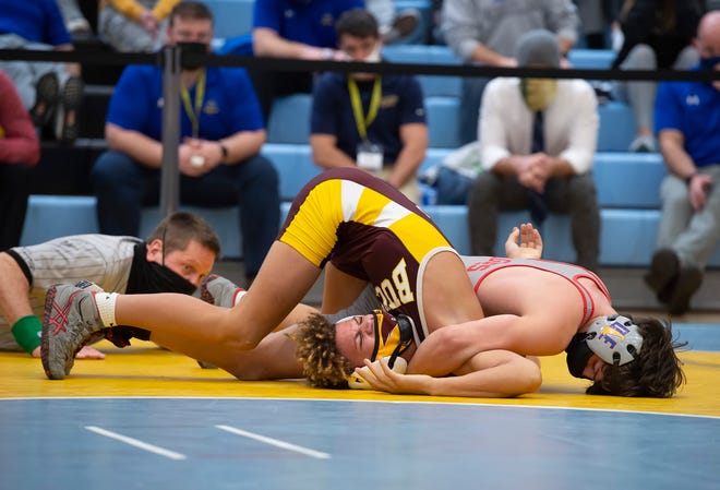 Smyrna's Gabe Giampietro (right)  and Milford's Trevor Copes wrestle in the 113 pound championship match at the DIAA State Individual Wrestling Championship at Cape Henlopen High School Wednesday, March 3, 2021.