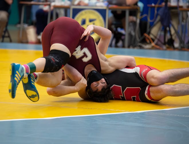 SmyrnaÕs Joey Natarcola and CaravelÕs Nick Hall  (left) wrestle in the 160 pound championship match at the DIAA State Individual Wrestling Championship at Cape Henlopen High School Wednesday, March 3, 2021.