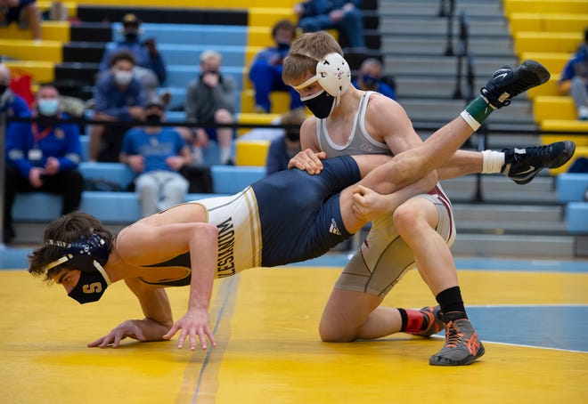 Salesianum’s Chris Gandolfo and Caravel’s Eddie Radecki wrestle in the 106 pound championship match at the DIAA State Individual Wrestling Championship at Cape Henlopen High School Wednesday, March 3, 2021.