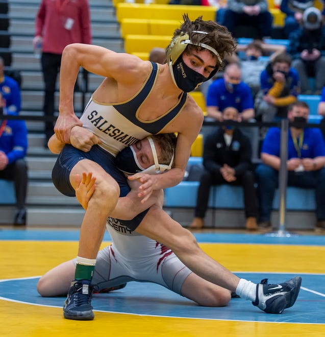 Salesianum’s Chris Gandolfo and Caravel’s Eddie Radecki wrestle in the 106 pound championship match at the DIAA State Individual Wrestling Championship at Cape Henlopen High School Wednesday, March 3, 2021.