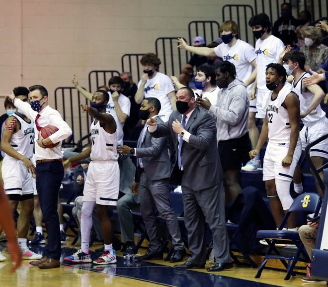 The Sals bench tries to help the referee on an out-of-bounds call in the Eagles' 43-42 win in a semifinal of the DIAA state tournament at Salesianum Thursday, March 11, 2021.