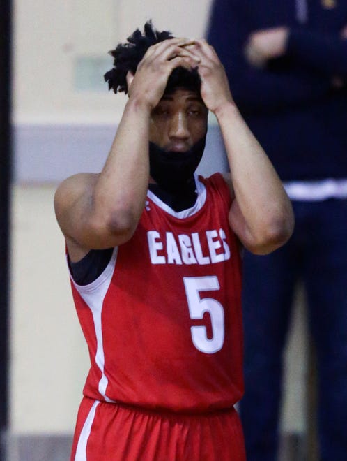 Smyrna's Robert Wiley reacts to a foul call in the Eagles' 43-42 win in a semifinal of the DIAA state tournament at Salesianum Thursday, March 11, 2021.